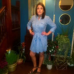 Light blue, front tie knot long sleeved mini dress. Boutique brand.